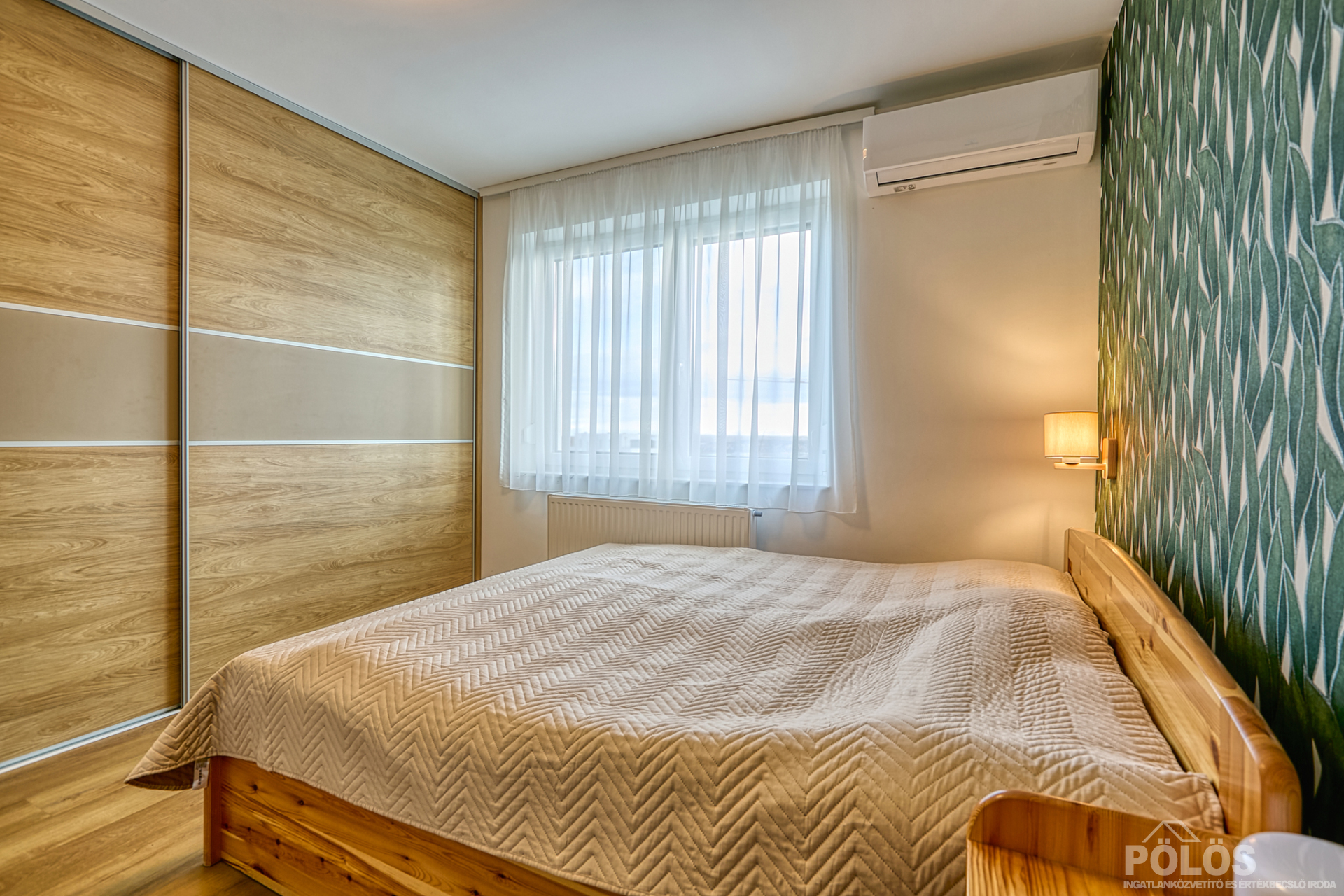 Sopronban Egeredi dombon igényes kialakítású kertkapcsolatos lakás eladó