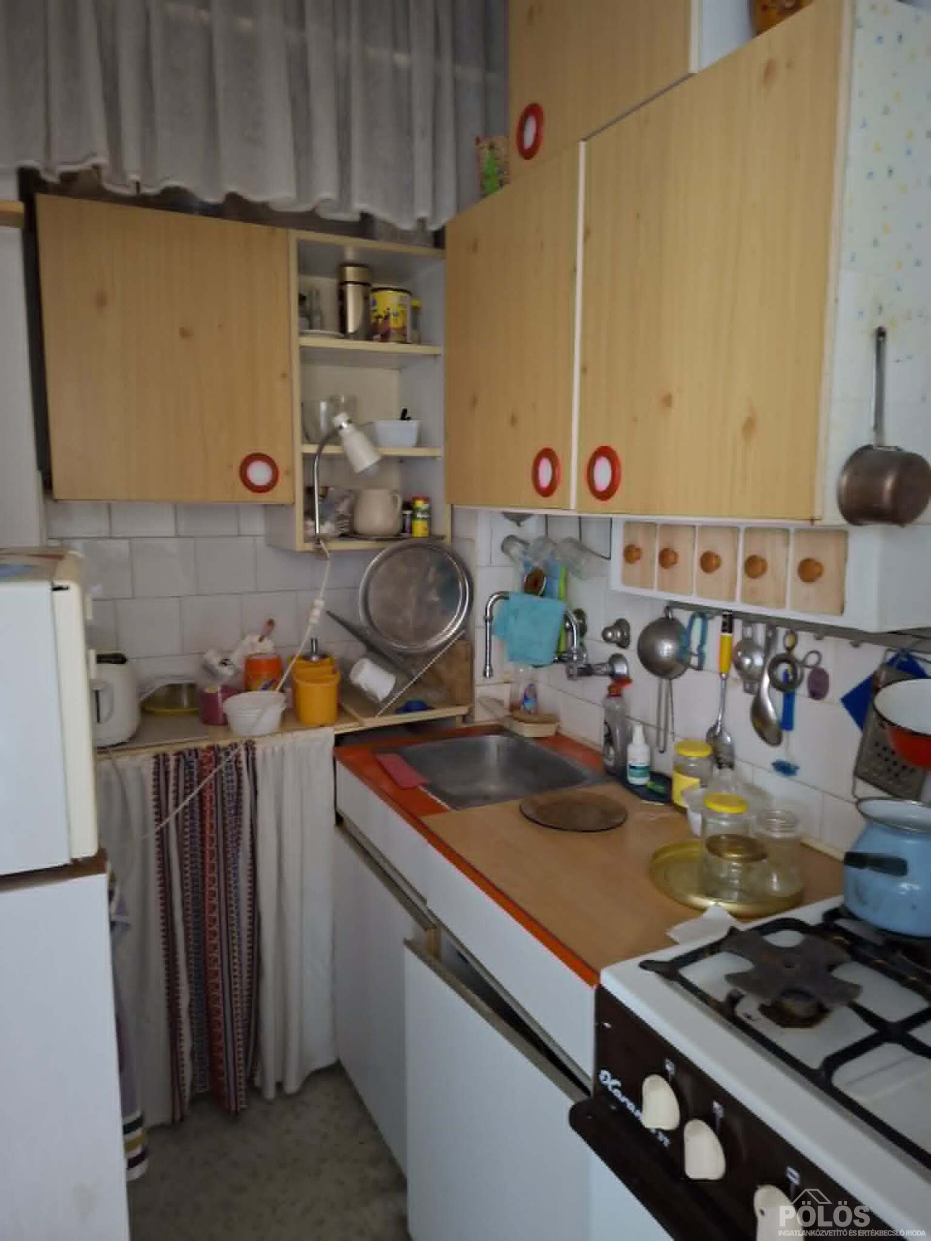 Alsólövérekben 1,5 szobás erkélyes lakás,garázs,tároló,kertrésszel eladó