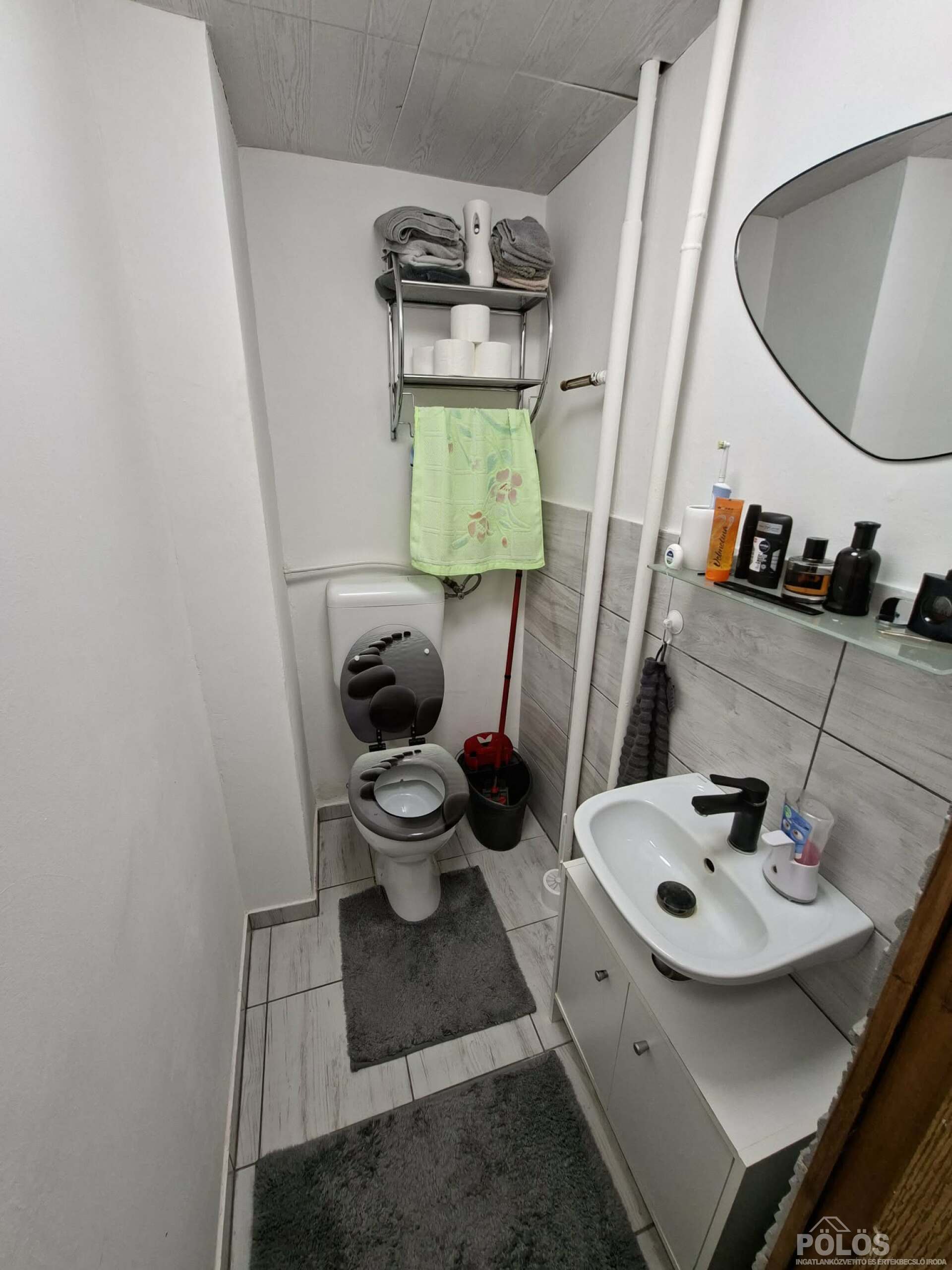 Belvároshoz közel igényesen felújított utcafronti házrész kertrésszel,garázzsal eladó